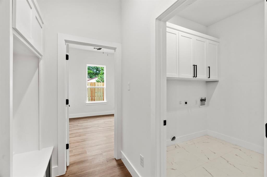 2227 Fordham Road Dallas, TX 75216 - Photo 19 of 30 a bathroom with a sink and a mirror