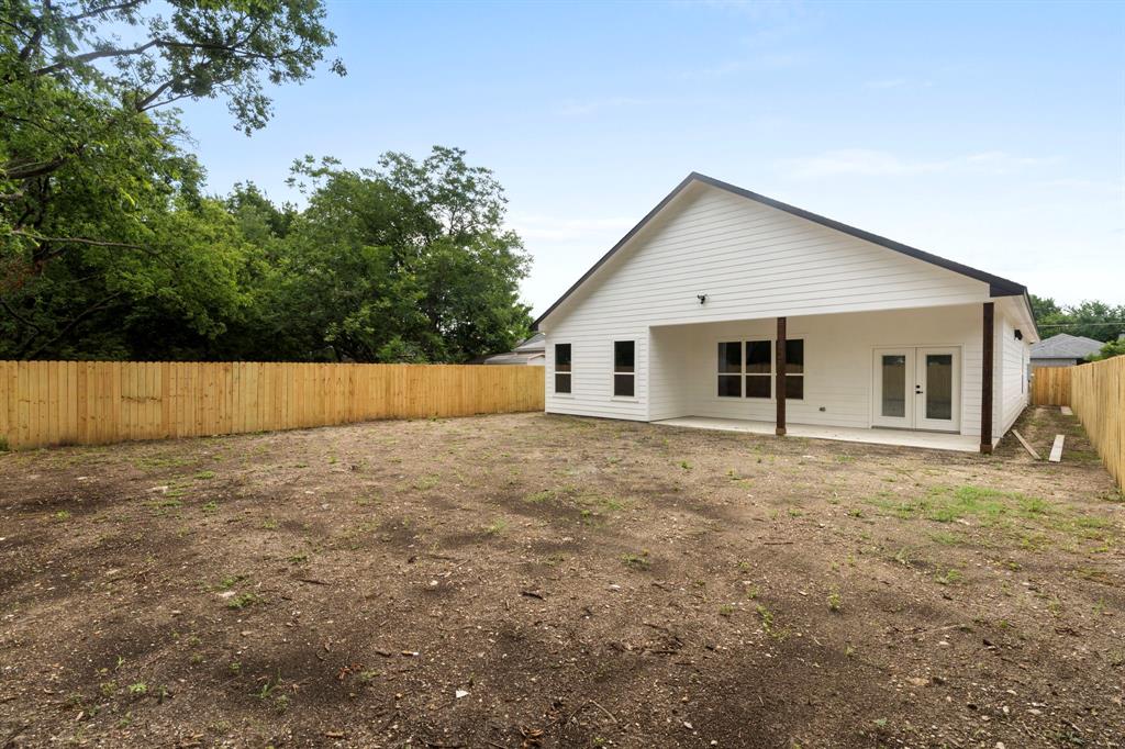 2227 Fordham Road Dallas, TX 75216 - Photo 20 of 30 a view of a house with a yard