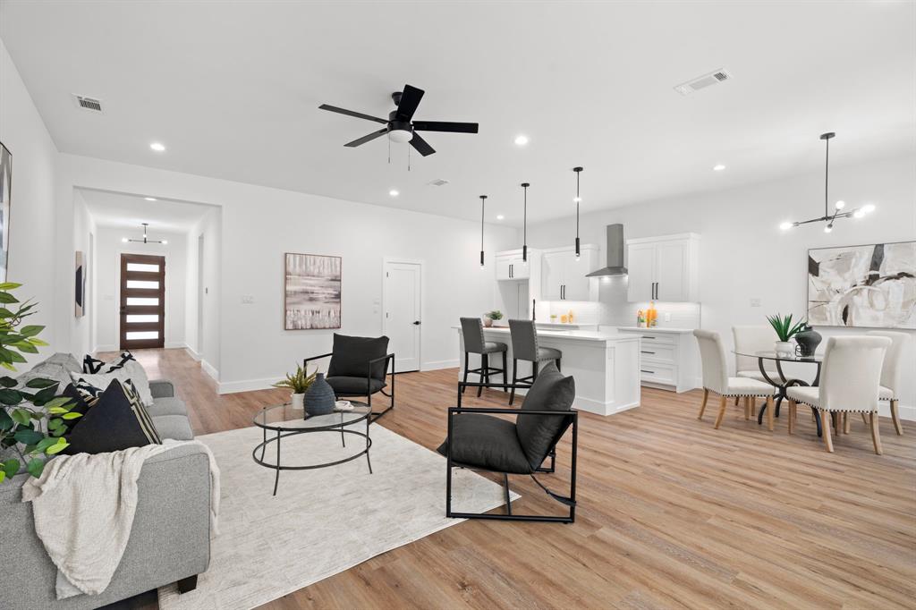 2227 Fordham Road Dallas, TX 75216 - Photo 2 of 30 a living room with furniture and a wooden floor