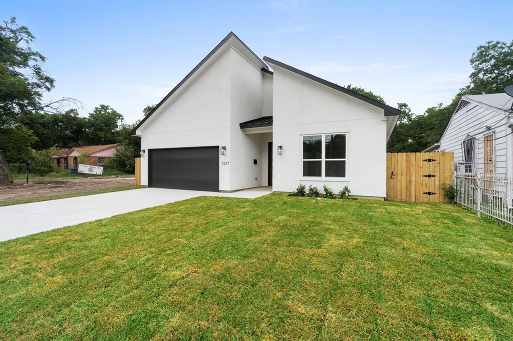 2227 Fordham Road Dallas, TX 75216 - Photo 25 of 30 a view of a house with backyard and garden