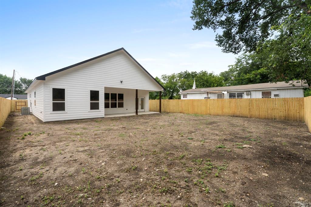 2227 Fordham Road Dallas, TX 75216 - Photo 26 of 30 a view of a house with a backyard