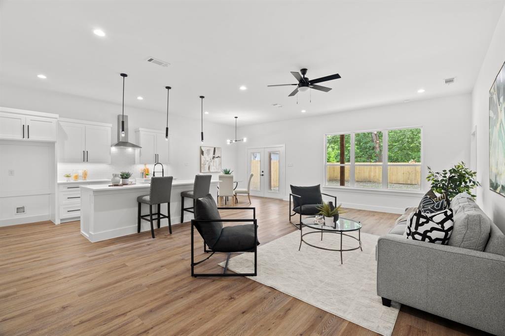 2227 Fordham Road Dallas, TX 75216 - Photo 28 of 30 a living room with furniture and a large window
