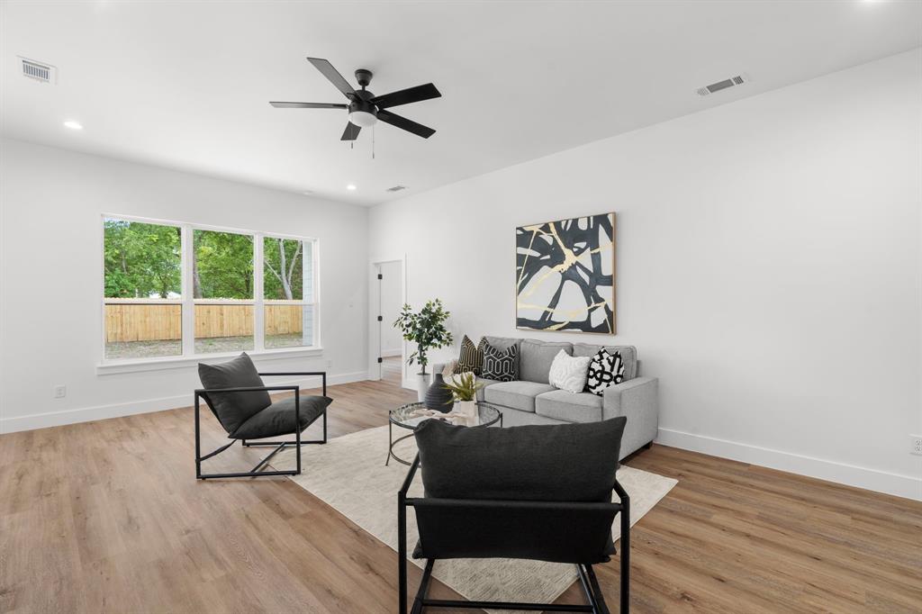 2227 Fordham Road Dallas, TX 75216 - Photo 30 of 30 a living room with furniture and a window