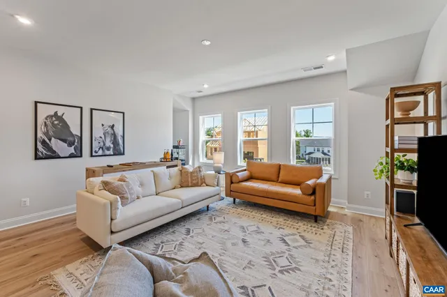 a living room with furniture and a couch