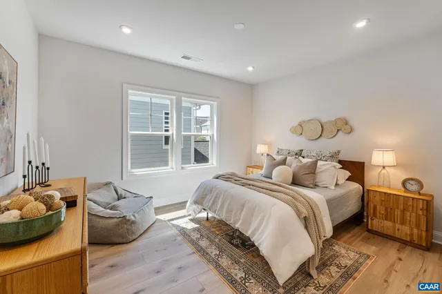 a bedroom with furniture and a bed