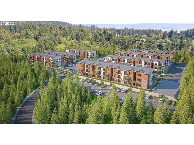 a balcony with furniture and city view