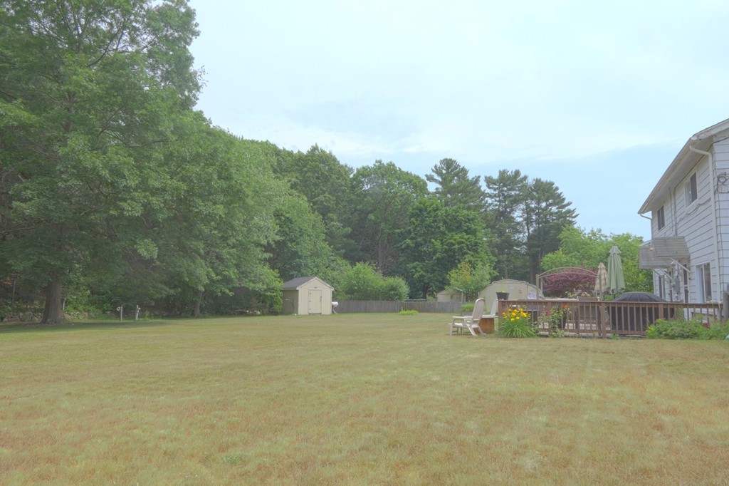 34 Montbatten Road, Unit L Billerica, MA 01821 - Photo 3 of 18 a view of a house with a yard