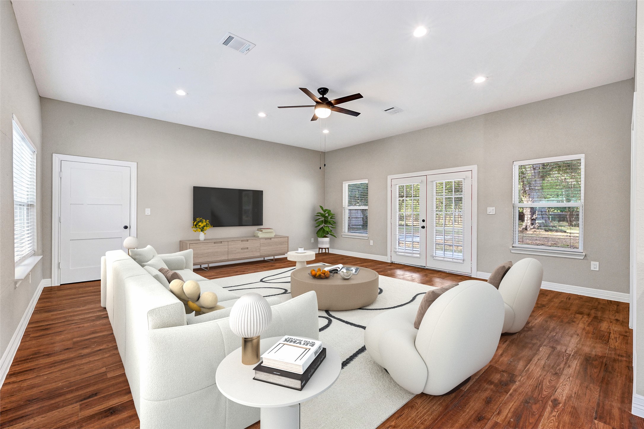 7045 Cayton Street Houston, TX 77061 - Photo 12 of 37 a living room with furniture and a flat screen tv