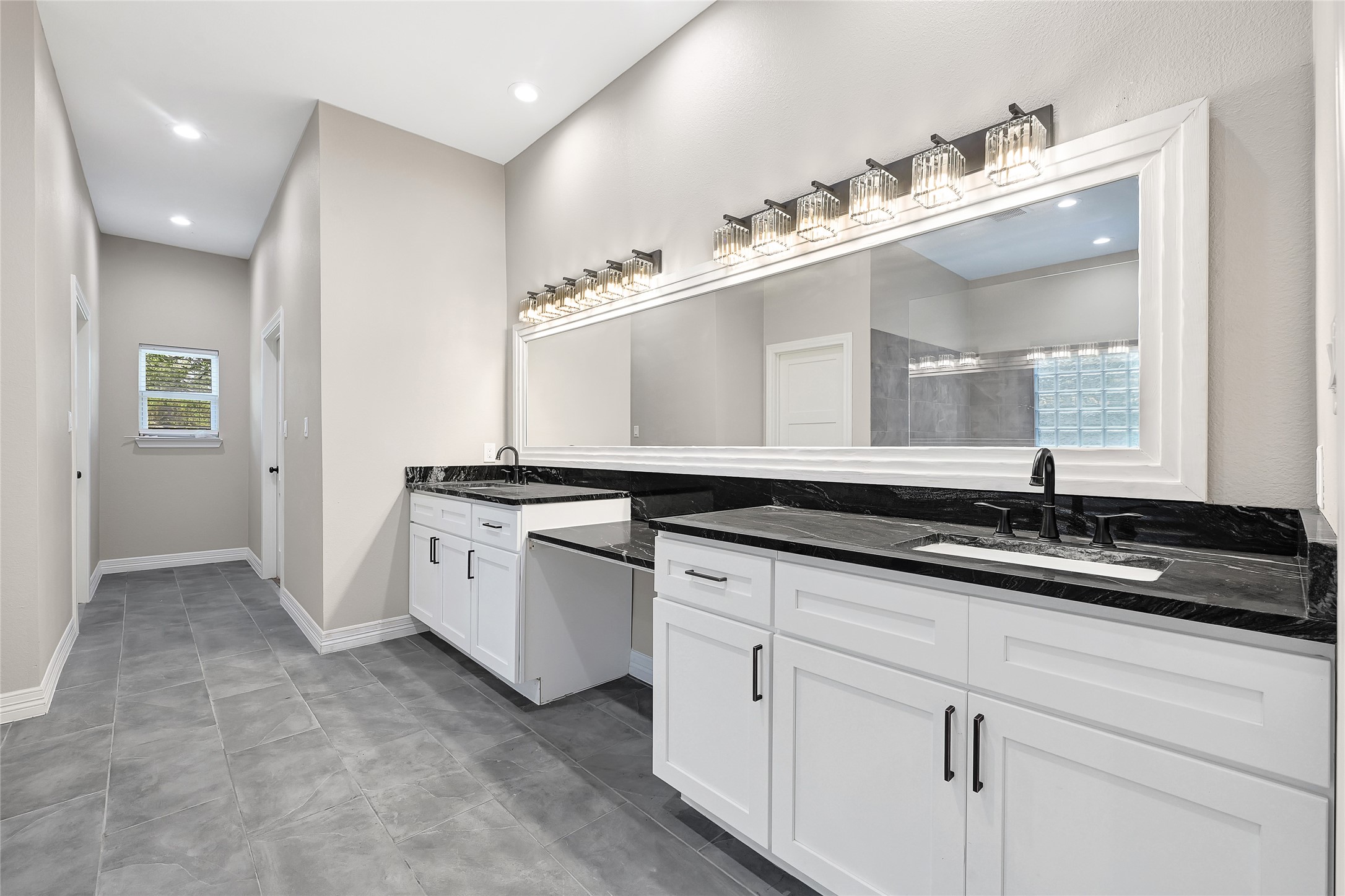 7045 Cayton Street Houston, TX 77061 - Photo 19 of 37 a bathroom with a sink and a mirror