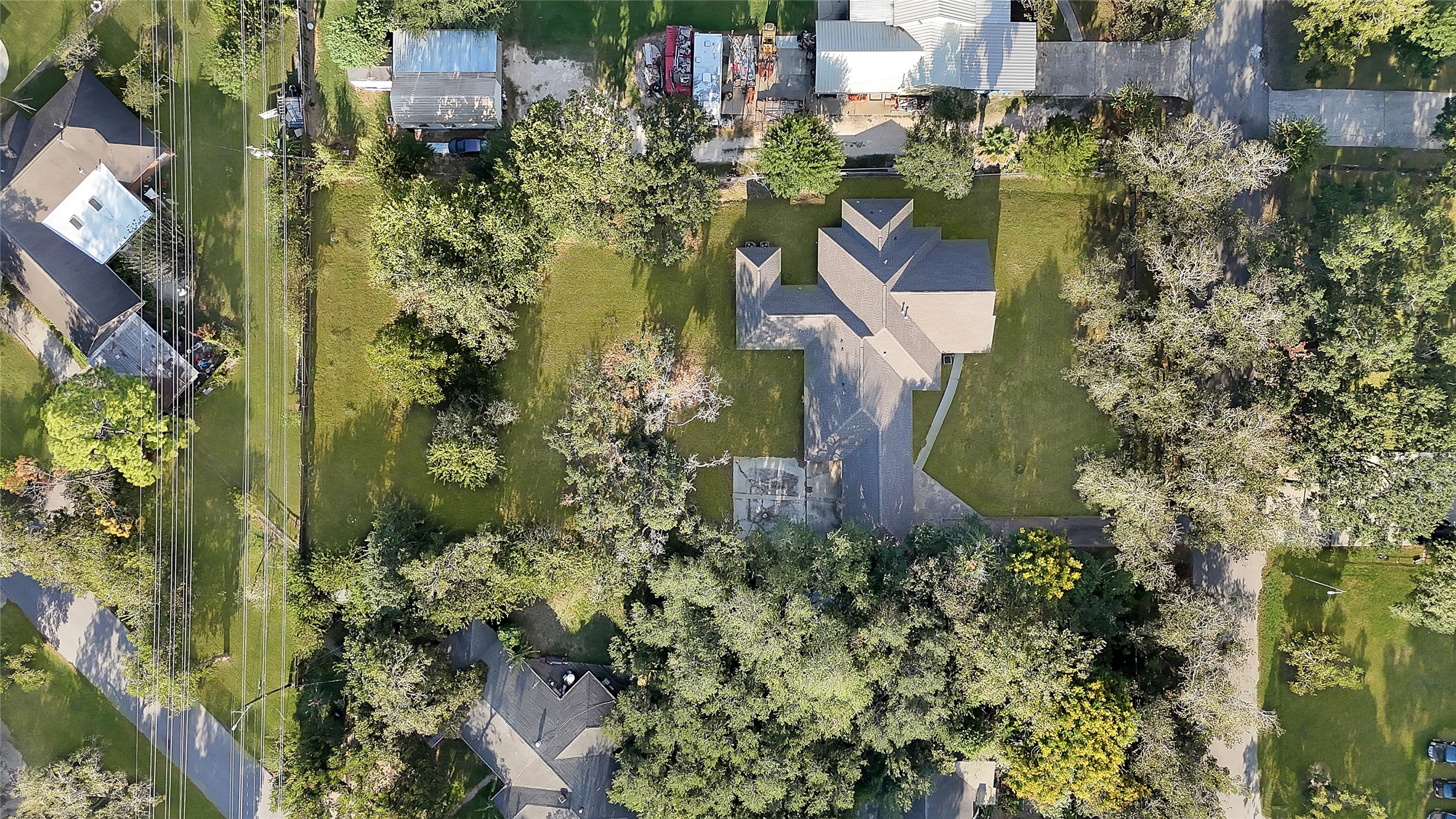 7045 Cayton Street Houston, TX 77061 - Photo 36 of 37 an aerial view of residential house with outdoor space and trees all around