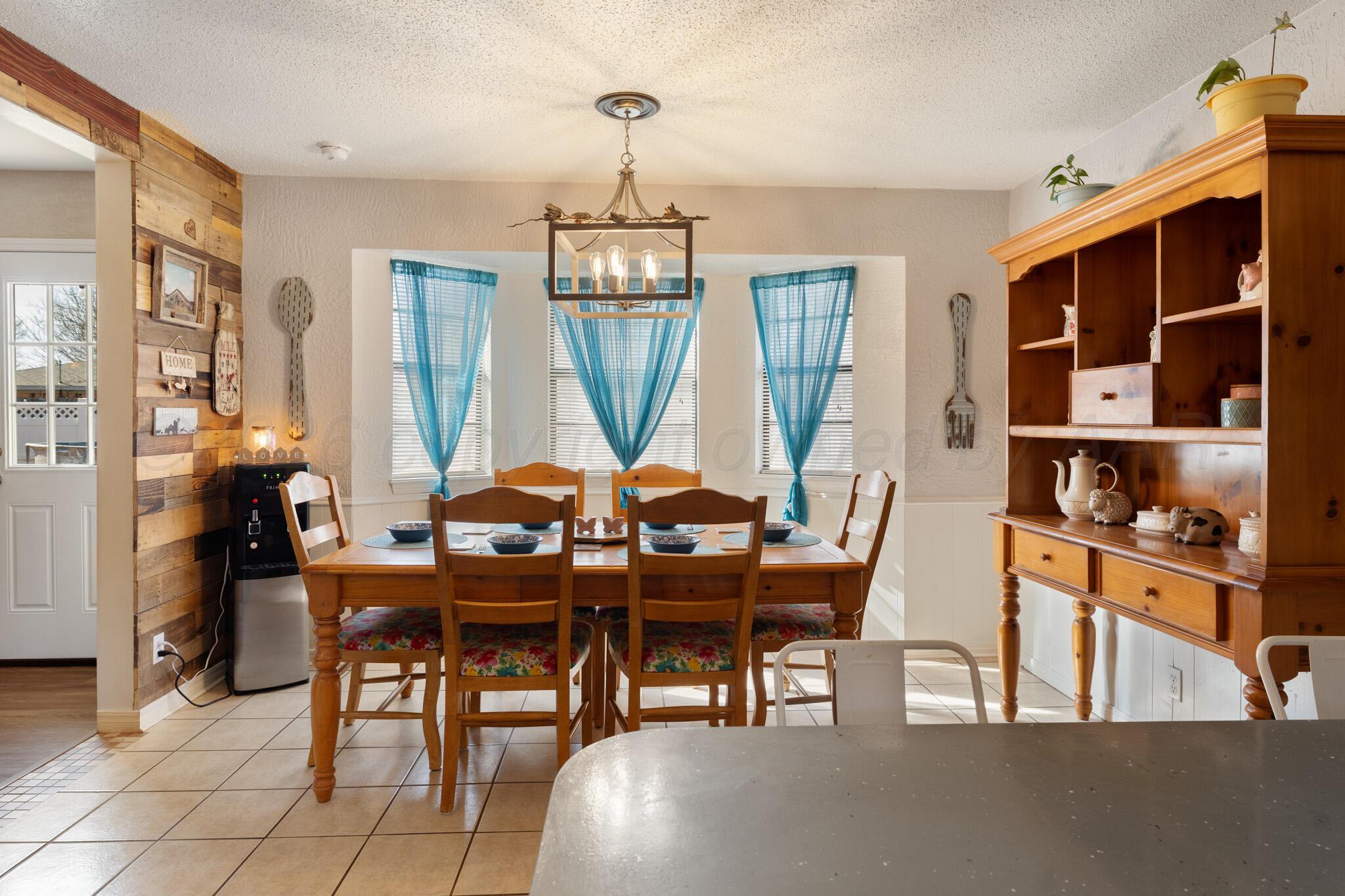 6114 Cornell Street Amarillo, TX 79109 - Photo 14 of 33 a view of a dining room with furniture