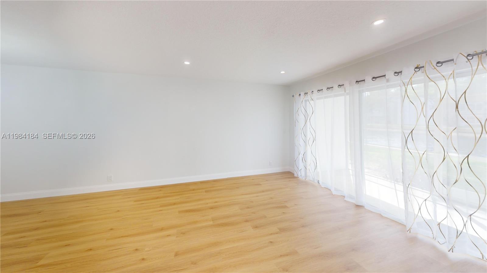 8846 West McNab Road, Unit 106 Tamarac, FL 33321 - Photo 14 of 39 a view of an empty room