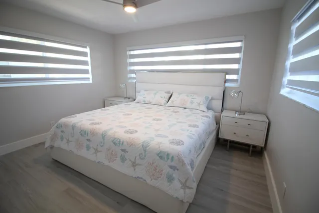 swimming pool view with a lake view