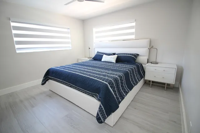 a view of swimming pool with chairs