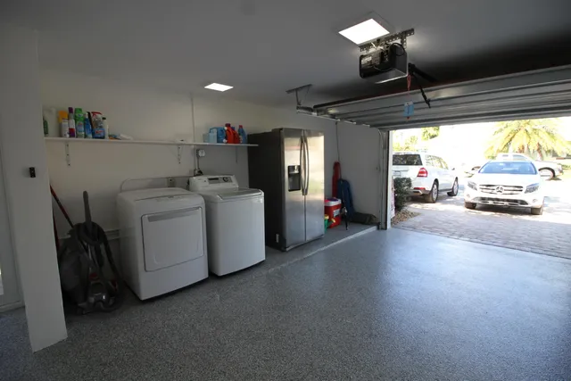 a view of a storage & utility room with washer and dryer