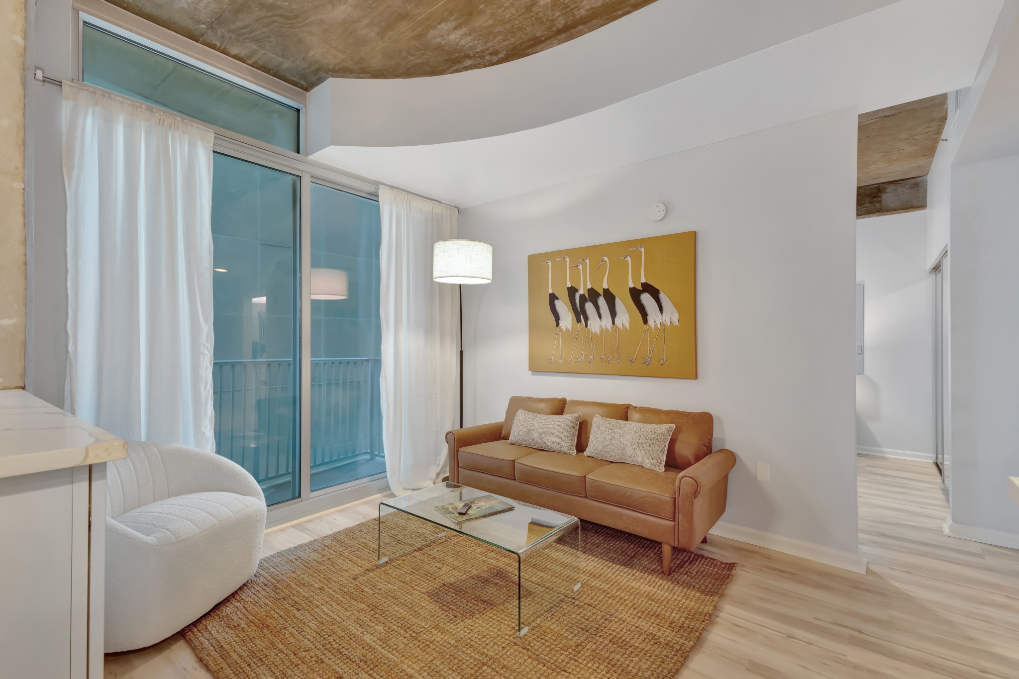 415 Church Street, Unit 1805 Nashville, TN 37219 - Photo 23 of 66 a bedroom with a bed and a couch