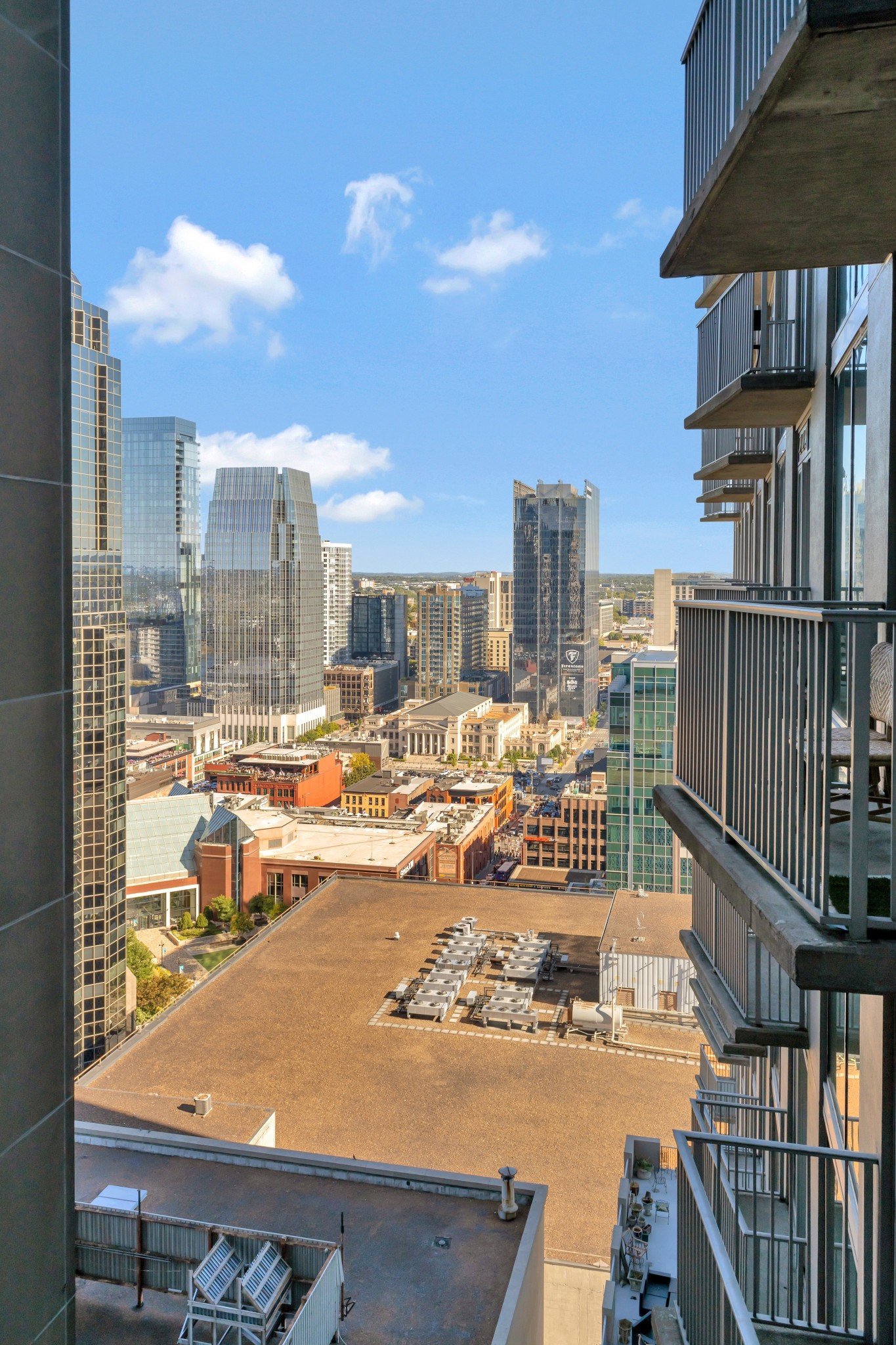 415 Church Street, Unit 1805 Nashville, TN 37219 - Photo 26 of 66 a view of a balcony with city view