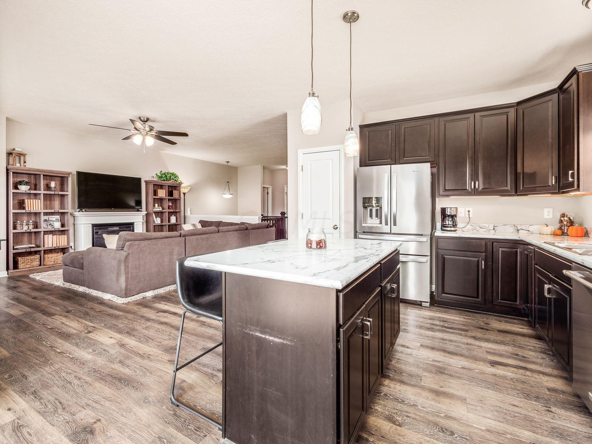 4929 Farview Road Columbus, OH 43231 - Photo 9 of 26 Kitchen open to family room