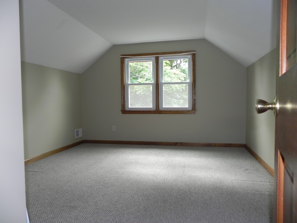 206 Parker Street Springfield, MA 01151 - Photo 12 of 21 an empty room with a window