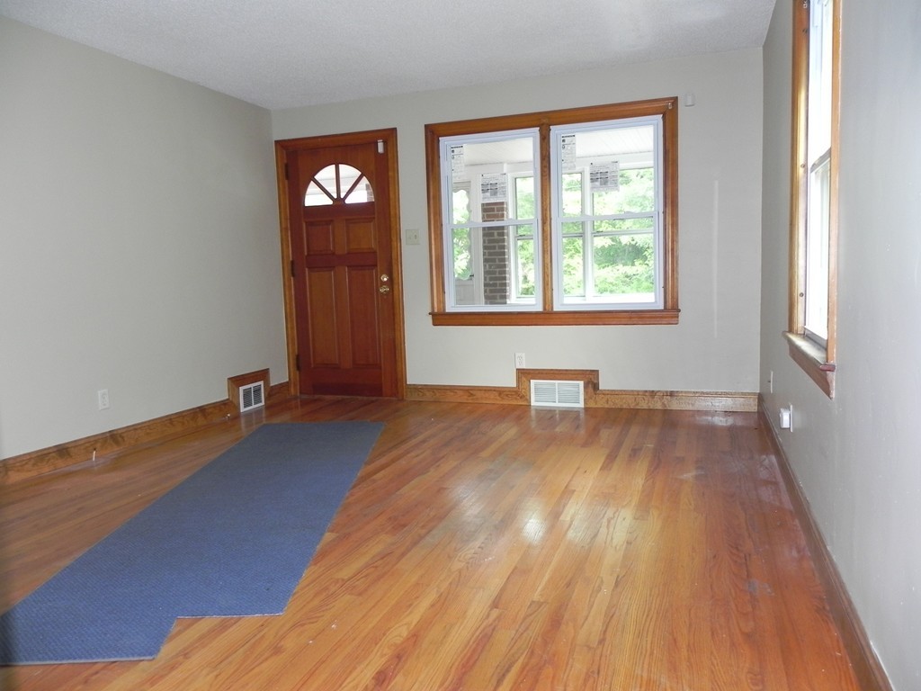 206 Parker Street Springfield, MA 01151 - Photo 6 of 21 a view of an empty room and window