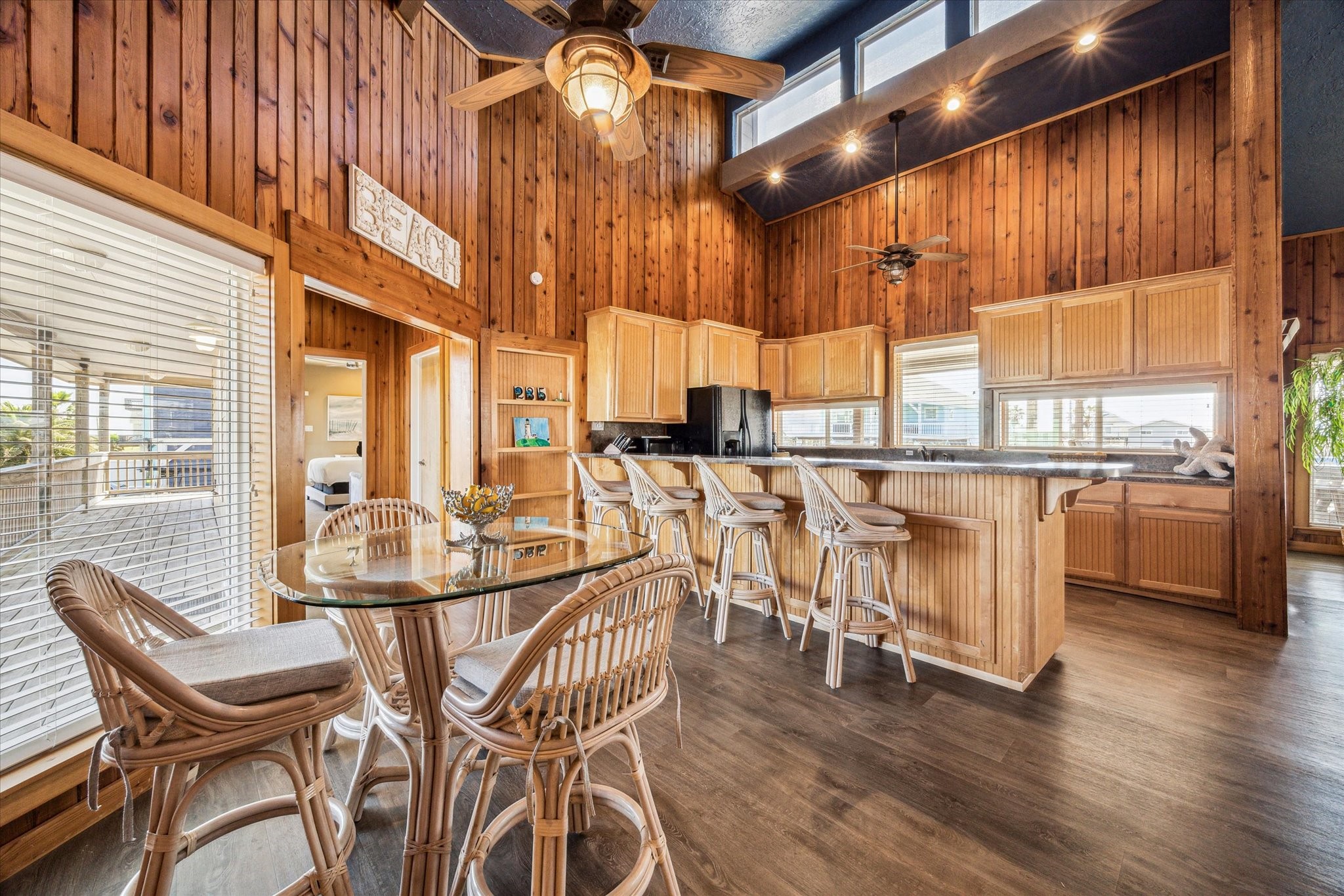 235 Galleon Freeport, TX 77541 - Photo 11 of 45 a dining room with furniture and wooden floor
