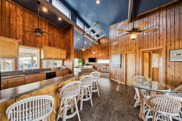 a kitchen with a stove a sink and a refrigerator