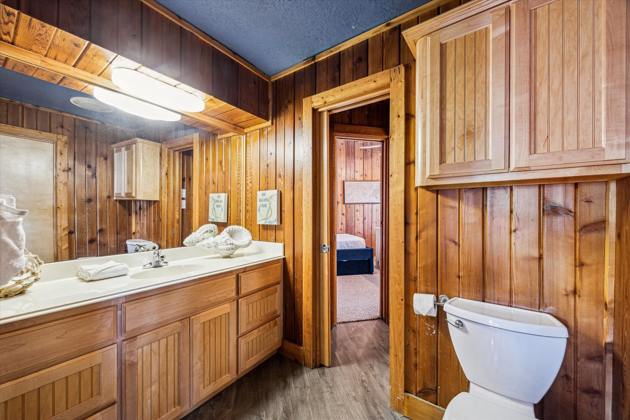 235 Galleon Freeport, TX 77541 - Photo 19 of 45 a bathroom with a sink and a mirror