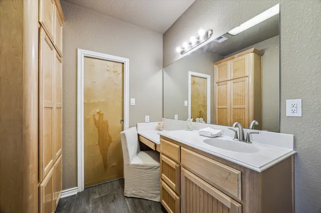 a bathroom with a toilet and a sink