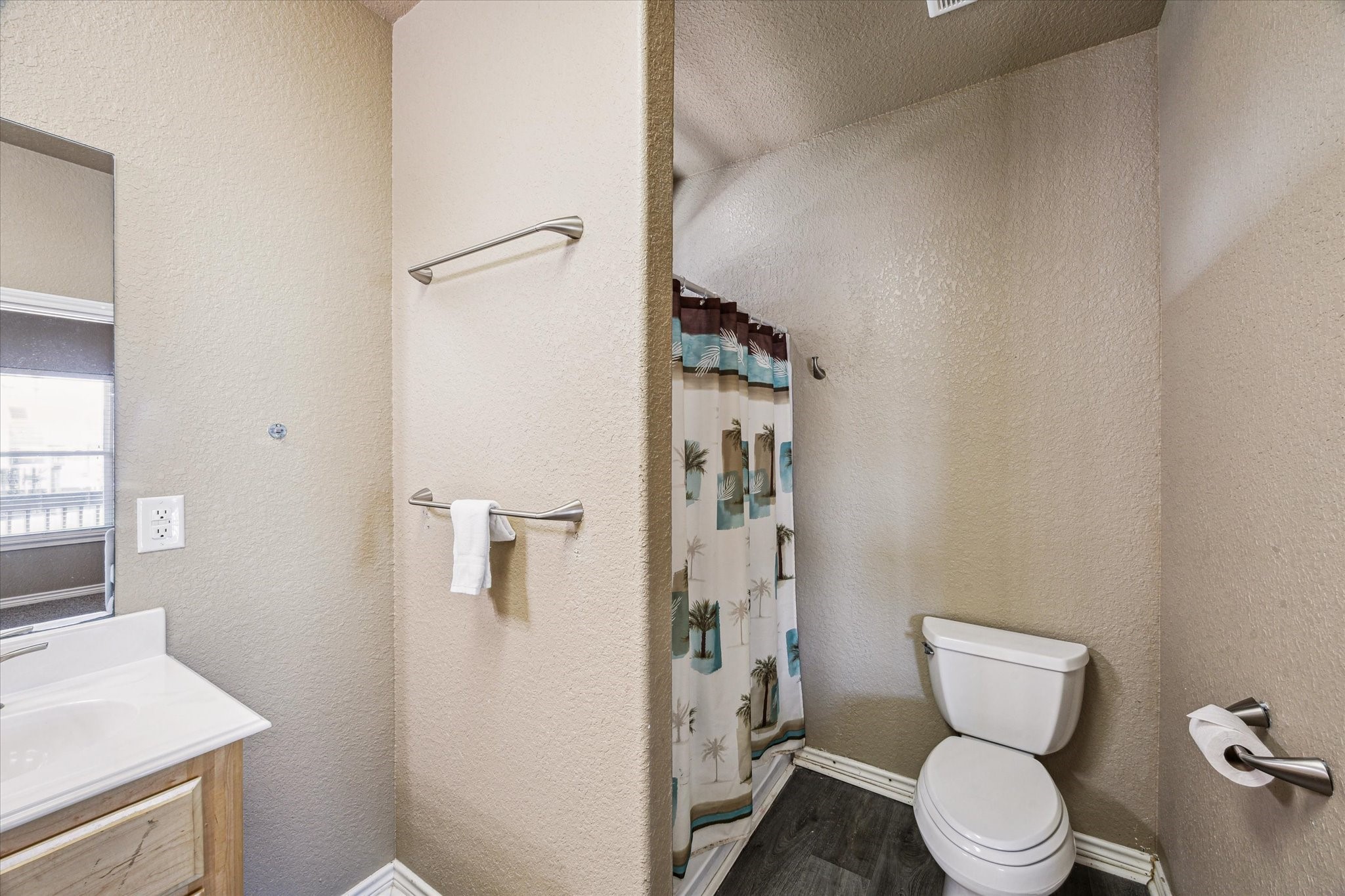 235 Galleon Freeport, TX 77541 - Photo 24 of 45 a bathroom with a toilet and a sink