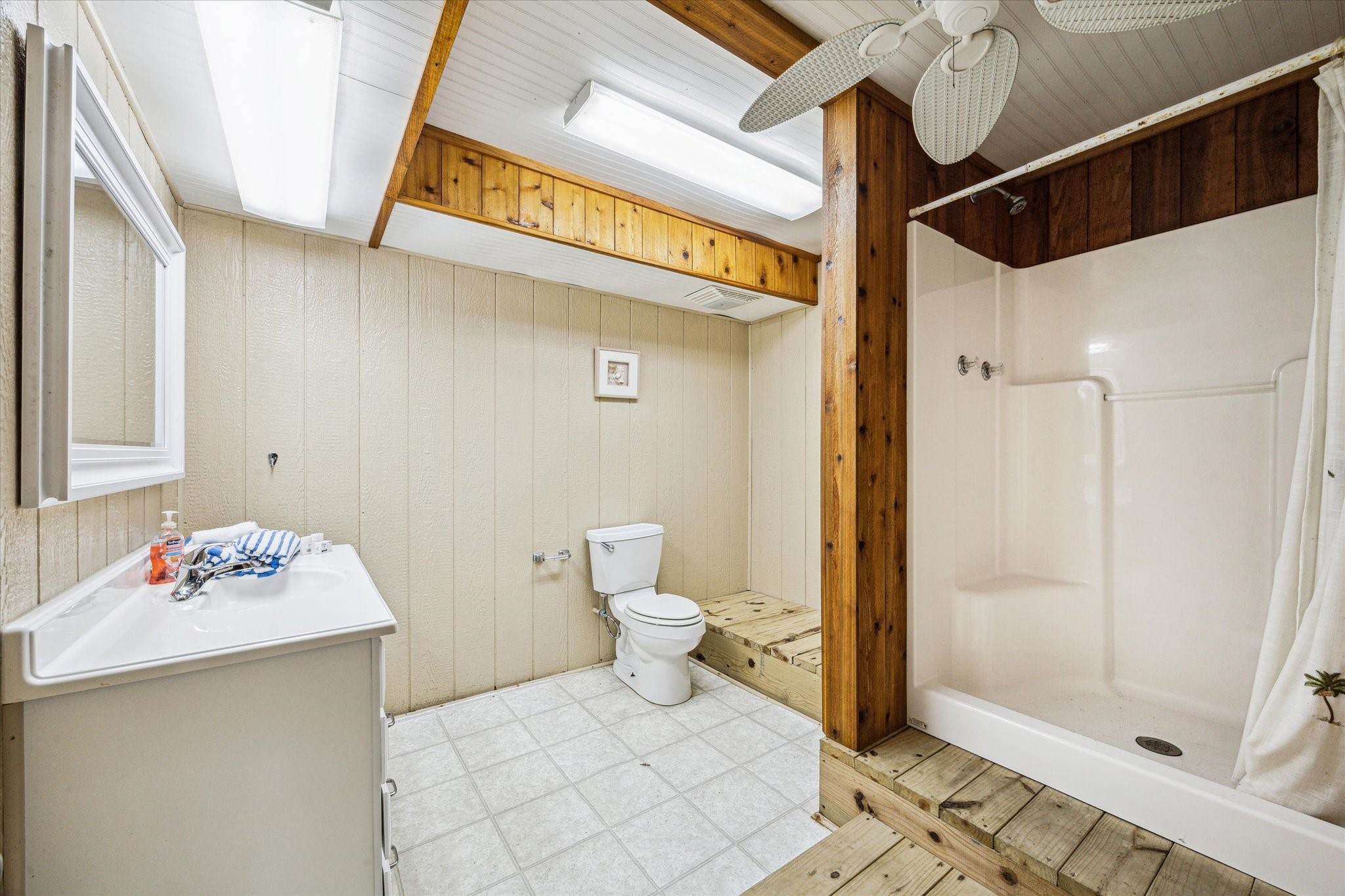 235 Galleon Freeport, TX 77541 - Photo 29 of 45 a bathroom with a sink toilet and shower