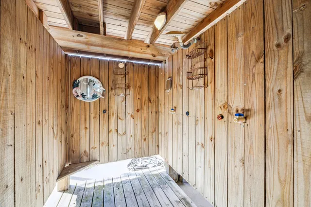 a view of swimming pool with seating area