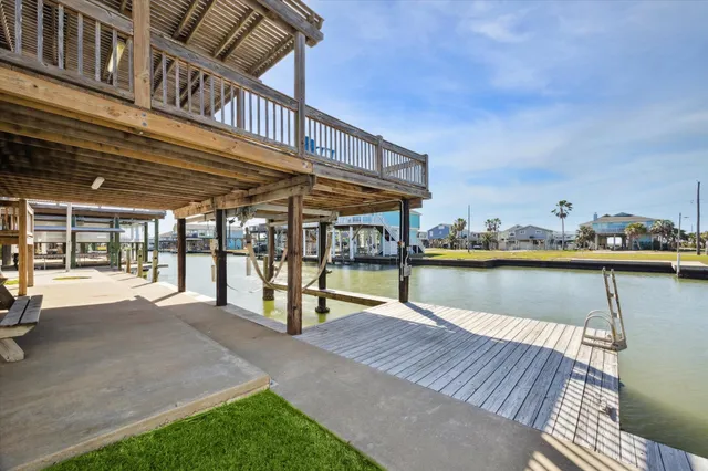 a front view of a house with outdoor seating