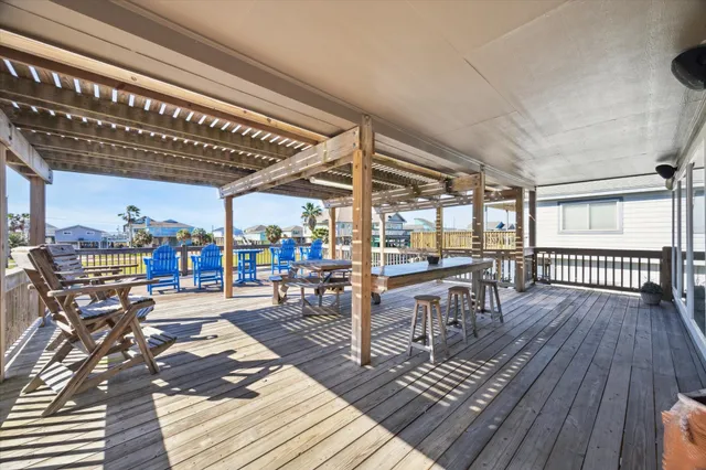 a view of a swimming pool with seating area