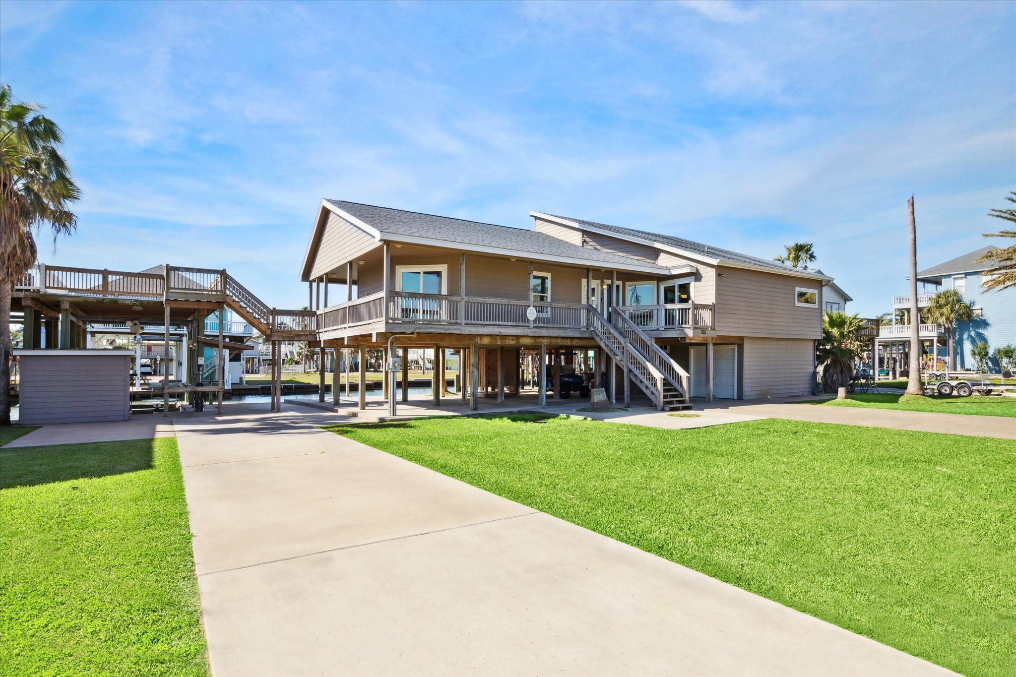 235 Galleon Freeport, TX 77541 - Photo 6 of 45 a view of a house with a yard and sitting area