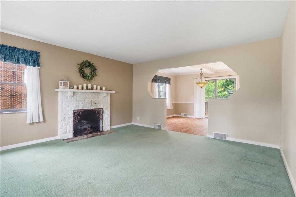 4730 Rolling Hills Road Pittsburgh, PA 15236 - Photo 5 of 50 Gas fire place in the living room.