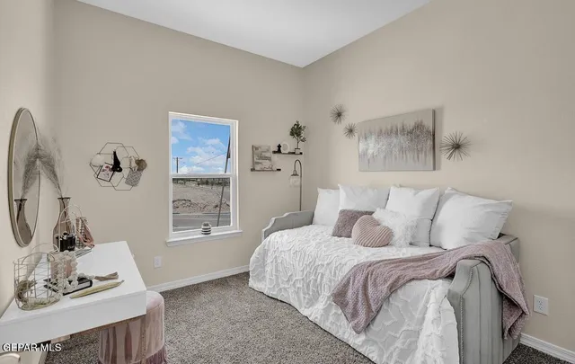 a bed room with a bed and a view of bathroom