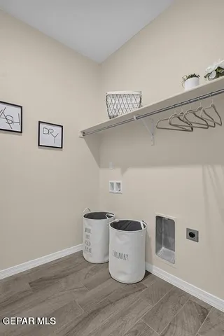 a bedroom with a bed and a mirror