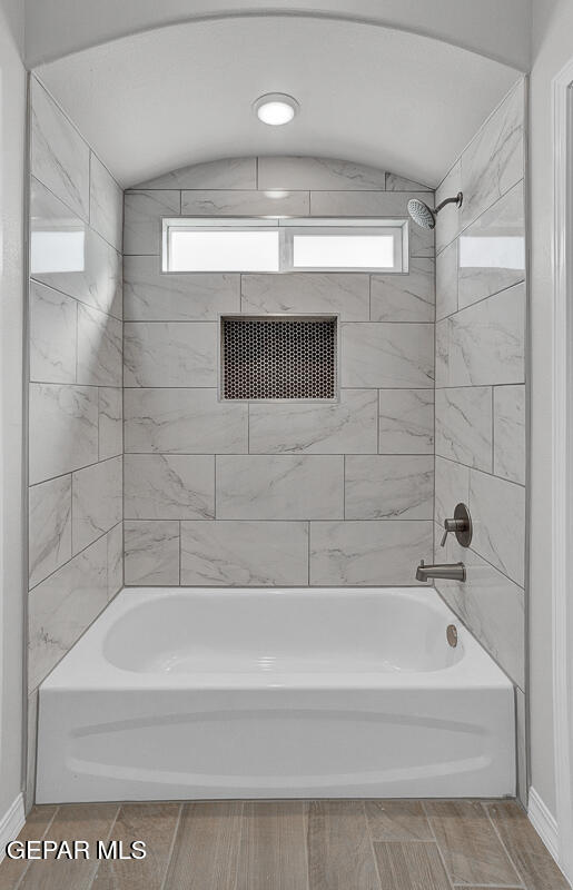 6943 Levee Circle Anthony, NM 88021 - Photo 31 of 36 a bathroom with a bathtub and a shower