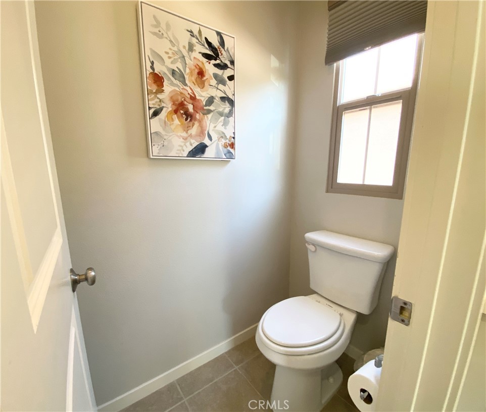 57 Bronze Leaf Irvine, CA 92620 - Photo 24 of 35 a white toilet sitting next to a window