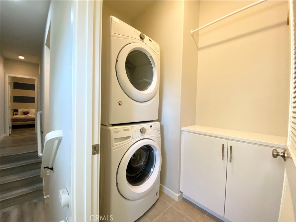 57 Bronze Leaf Irvine, CA 92620 - Photo 25 of 35 a utility room with dryer and washer
