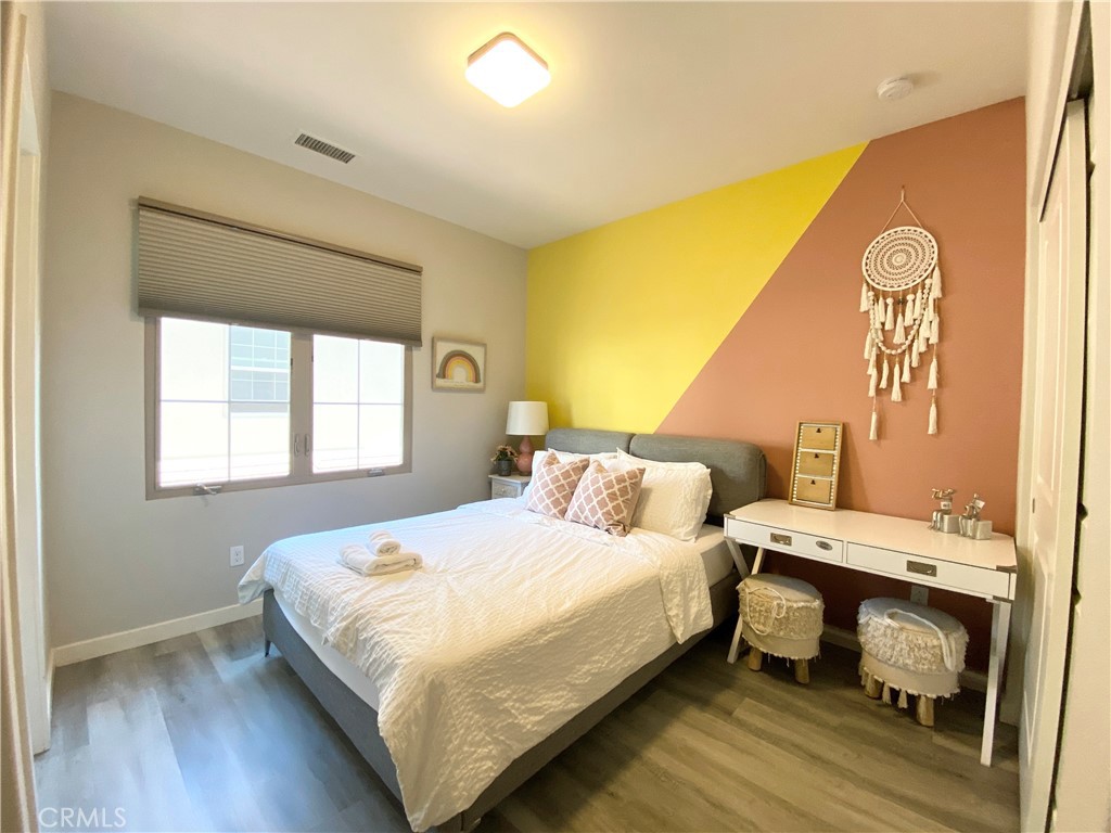 57 Bronze Leaf Irvine, CA 92620 - Photo 27 of 35 a bedroom with a bed and a window