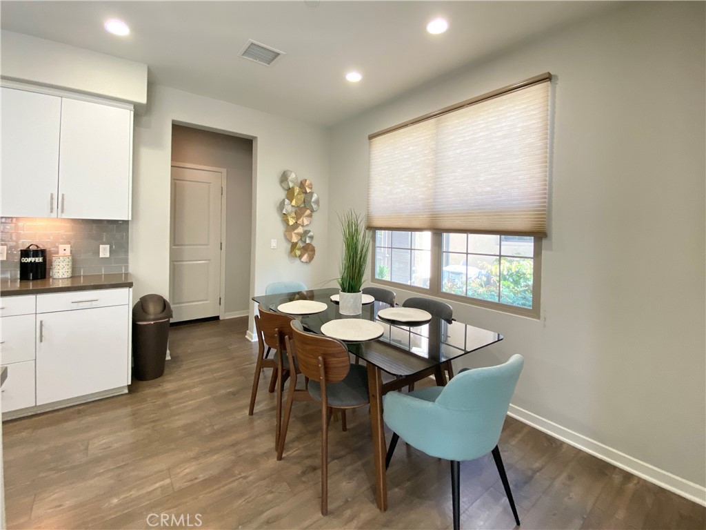 57 Bronze Leaf Irvine, CA 92620 - Photo 6 of 35 a view of a dining room with furniture and window