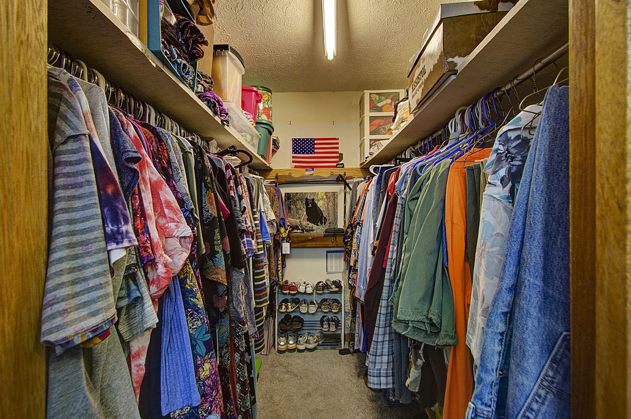 4720 Salem Road Greenback, TN 37742 - Photo 34 of 40 a view of walk in closet with clothes