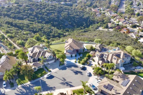 an aerial view of a highlighted house
