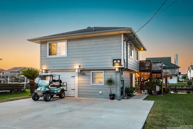 a view of car parked in front of house