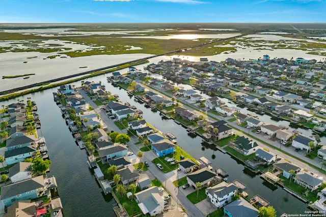 a view of a house with a yard porch and sitting area
