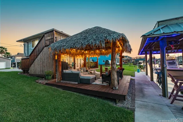 a view of outdoor space yard deck patio and outdoor kitchen