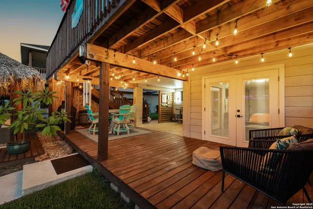 a view of a porch with wooden floor