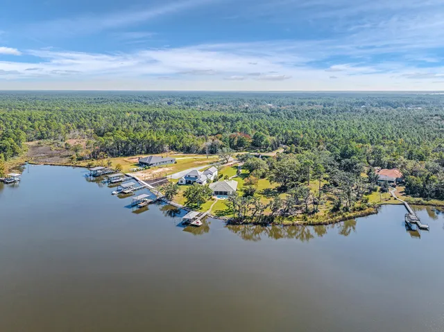 a view of a lake with a building in the background