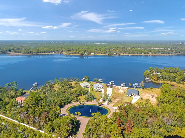 a view of a swimming pool with an outdoor seating